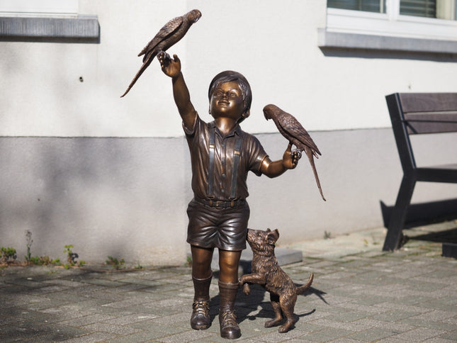 Bronzen beeld Jongen met vogeltjes en hond 104x50x75cm