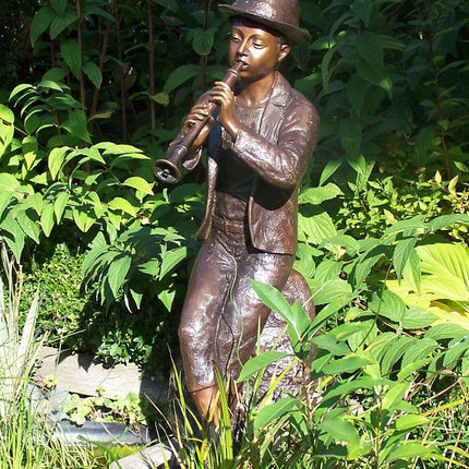 Bronzen beeld Jongen met fluit groot model 148x50x65cm 68kg